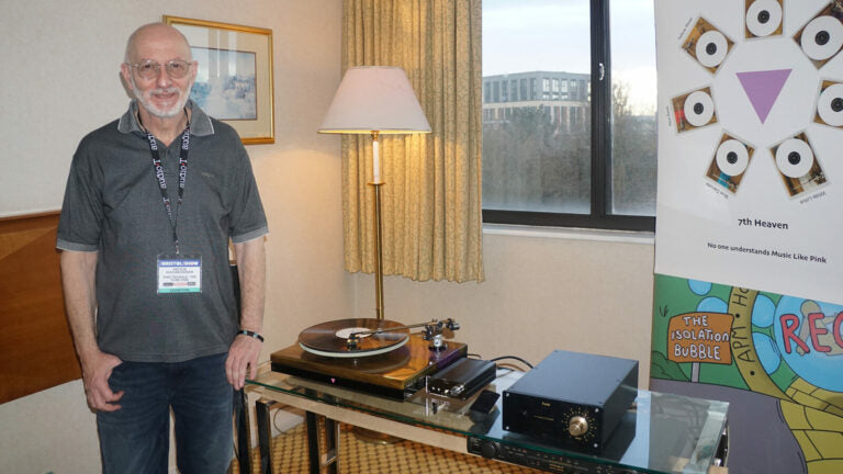 Arthur Khoubesserian on the bench, beside a Funk Firm turntable.
